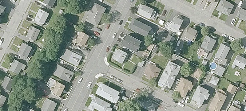 Well-Maintained Two-Family Corner Lot Home