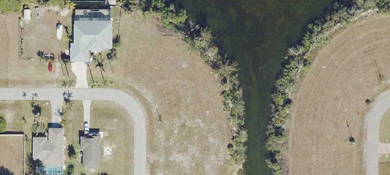 Waterfront Land with Canal Views