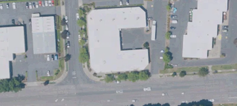 Corner Warehouse with Glass Storefront
