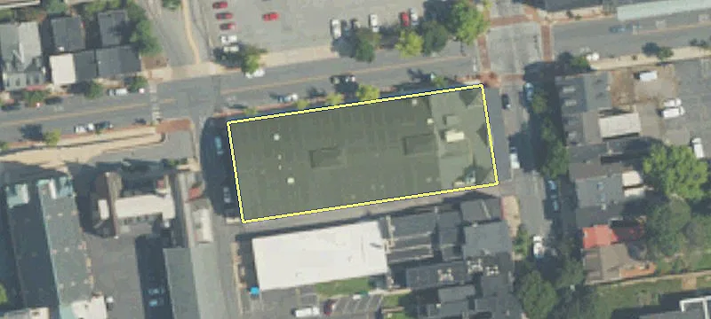 Three-Story Brick Building For Sale