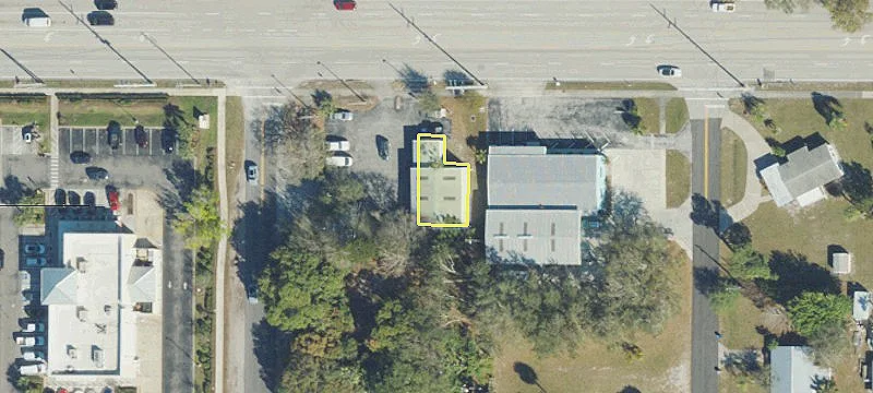 Automotive Garage on High-Visibility Land