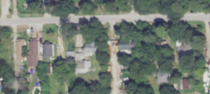 Unrestricted Land with Existing Structure
