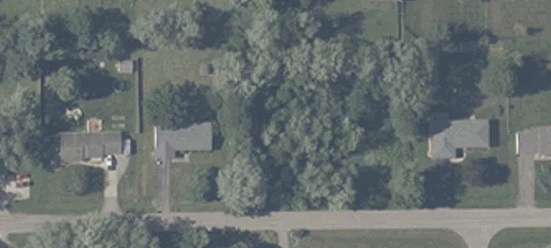 Wooded Lot Near City Utilities