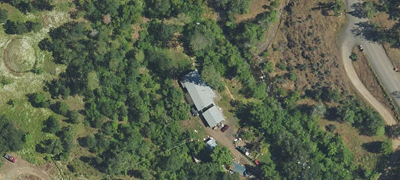 Creek-Frontage Homestead on Private Acres
