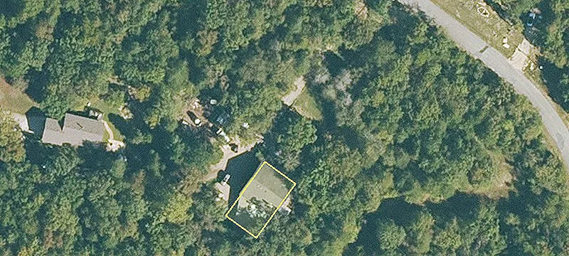 Wooded Corner Lot Near Amenities
