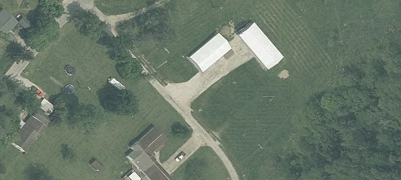 Versatile Land Parcel with Garages