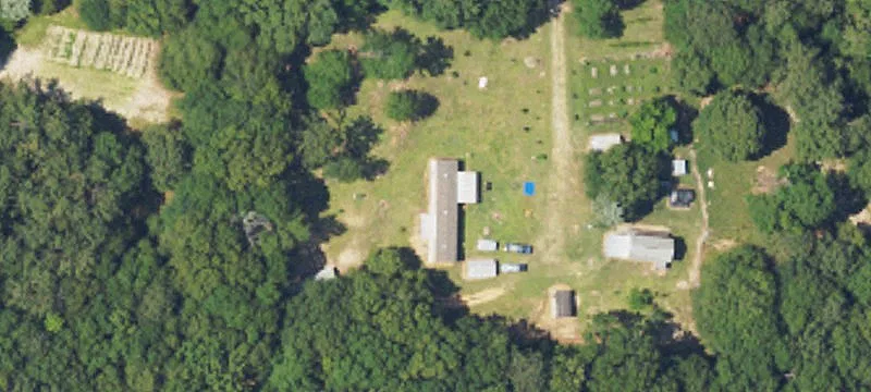 Secluded Acreage with Pond Near Troy