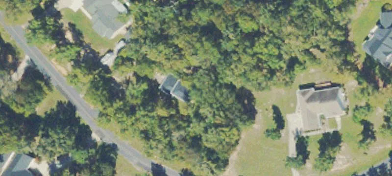 Land Near Water and Beach