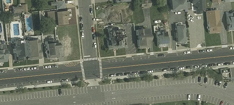 Land Near Ocean and Lake