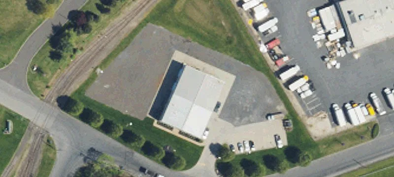 Secured Paved and Fenced Lot