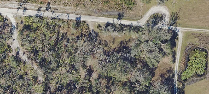 Wooded Acreage with Utilities