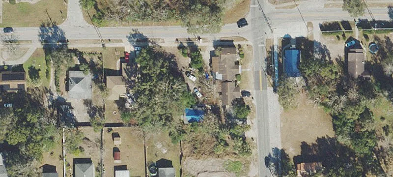 Income-Producing Triplex on Large Lot