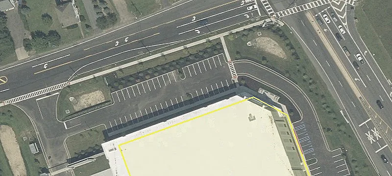 Fenced Land Parcel with Drive-Through Potential