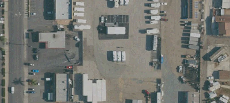 Paved Fenced Auto Sales Lot