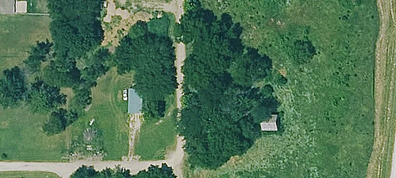 Land with Metal Shop Building
