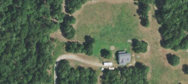 Wooded Land with Cleared Building Site