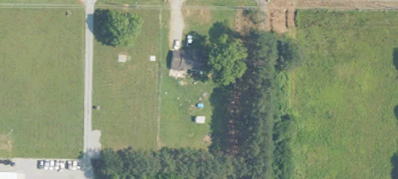 Cross-Fenced Horse Farm with Barn