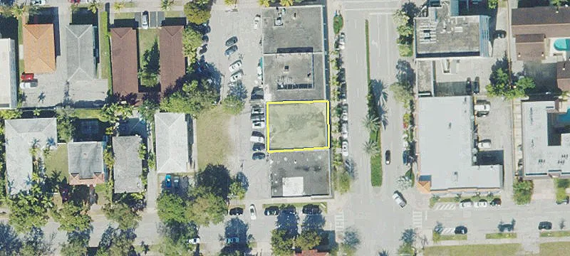 Corner Retail Building with Vacant Lot