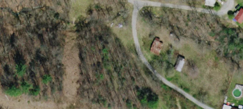 Unrestricted Land with Existing Building