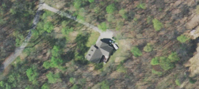 Semi-Wooded County Road Home Lot