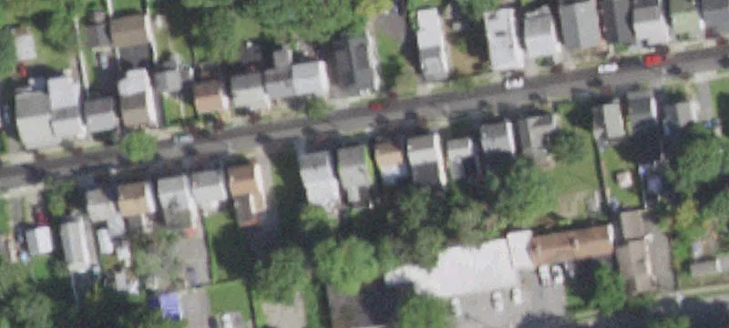 Brick Three-Unit Residential Property