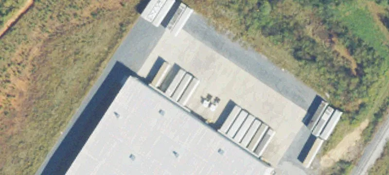 Expandable High-Bay Warehouse with Rail Access