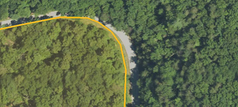 Wooded Buildable Lot with Rock Wall