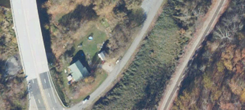 Riverfront Land with Metal Garage