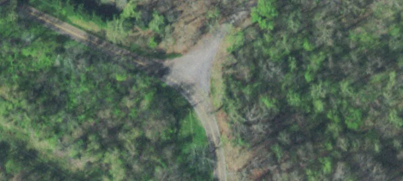 Land with Creek and Two Barns