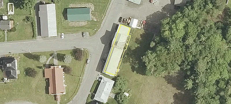 Two-Story Flex Space with Garage Doors