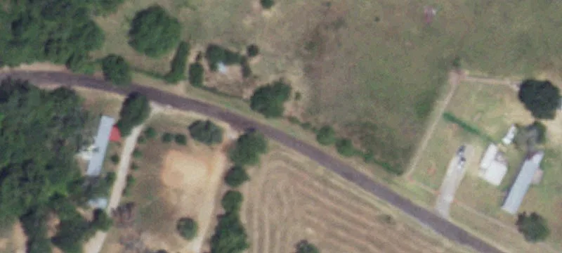 Fenced Country Acreage with Road Frontage