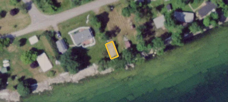 Waterfront Land with Cottage Structures