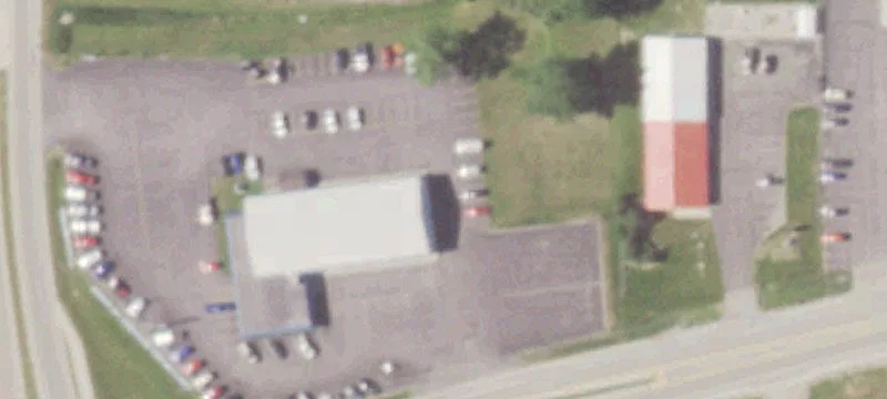 Vacant Automotive Lot with Building