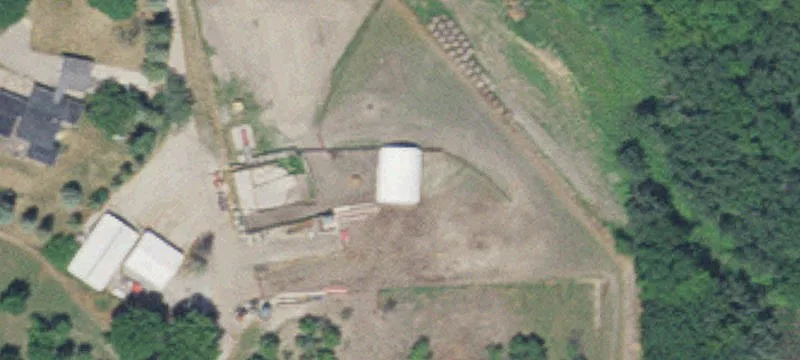 Fenced Cattle Farm with Hay Shed