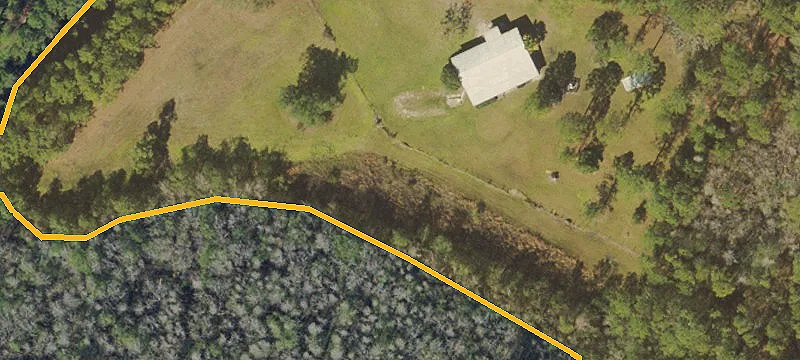 Buildable Fenced Acreage with Gate