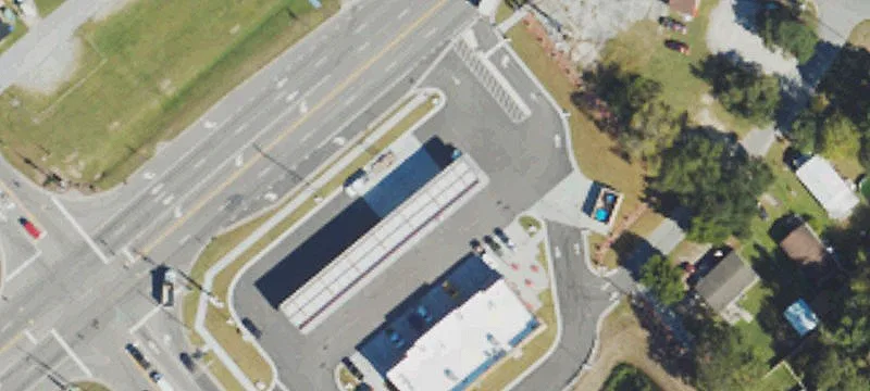 Corner Retail Land with Two Buildings