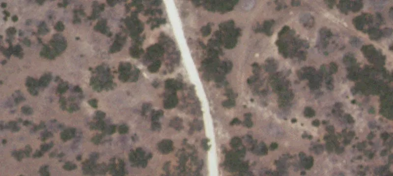 High-Fenced Ranch Land with Barndominium
