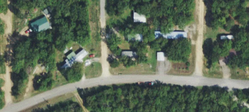 Waterfront Land with Two Outbuildings