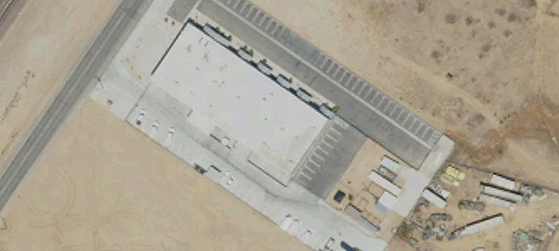 Fenced Industrial Yard with Solar Gate