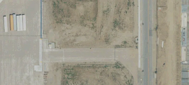 Fenced Truck Terminal with Trailer Stalls