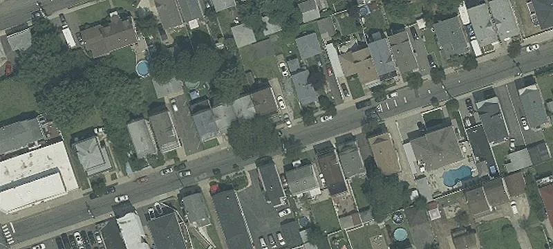 Two-Family Home with Private Driveway