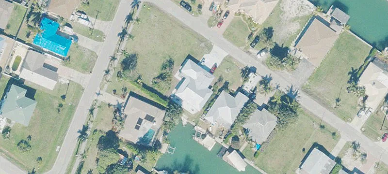 Gulf-Access Triplex on Quiet Canal