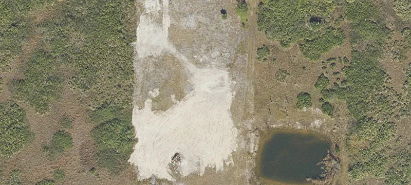 Fenced Residential Development Land