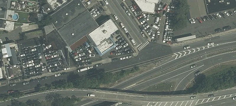 Corner Automotive Facility with Licenses