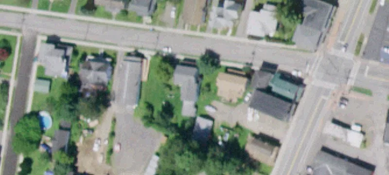 Well-Maintained Triplex with Off-Street Parking