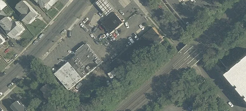 Fenced Graveled Commercial Lot