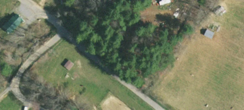 Wooded Recreational Acreage with Barn
