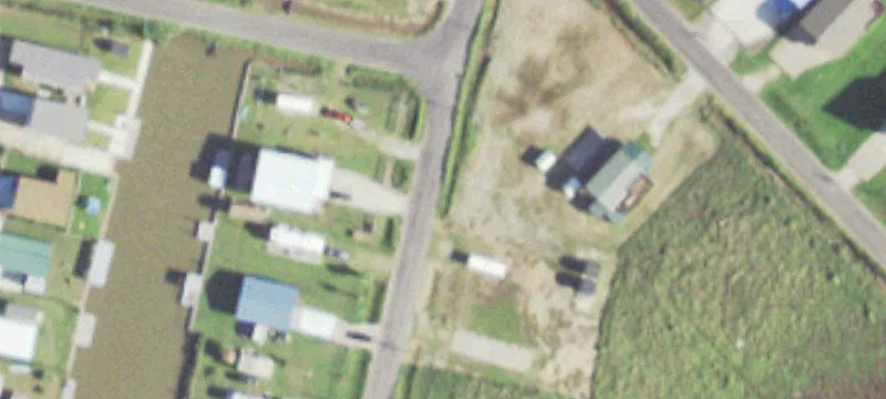 Waterfront Land with Metal Building