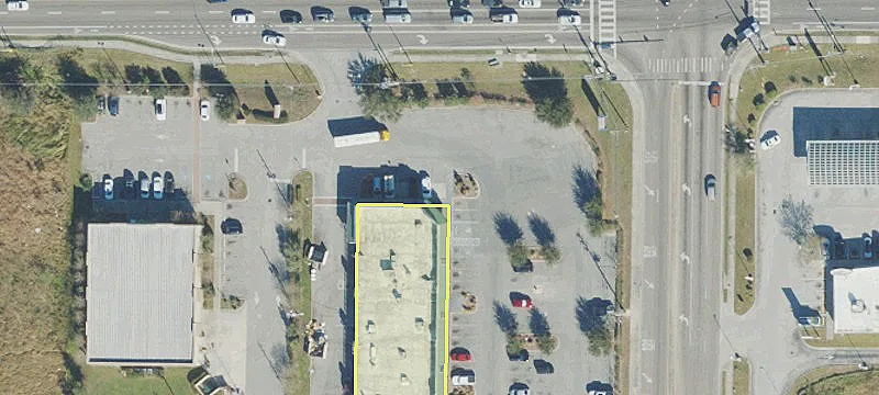 Multi-Tenant Retail Center with Land