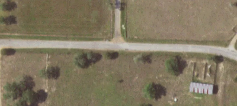 Unimproved Ranch with Pond